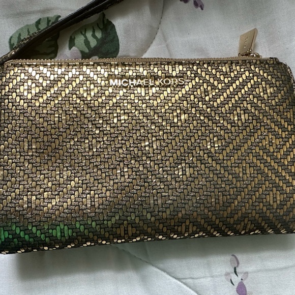 A golden Michael Kors “Adele” Smartphone Wristlet - Picture 6 of 6